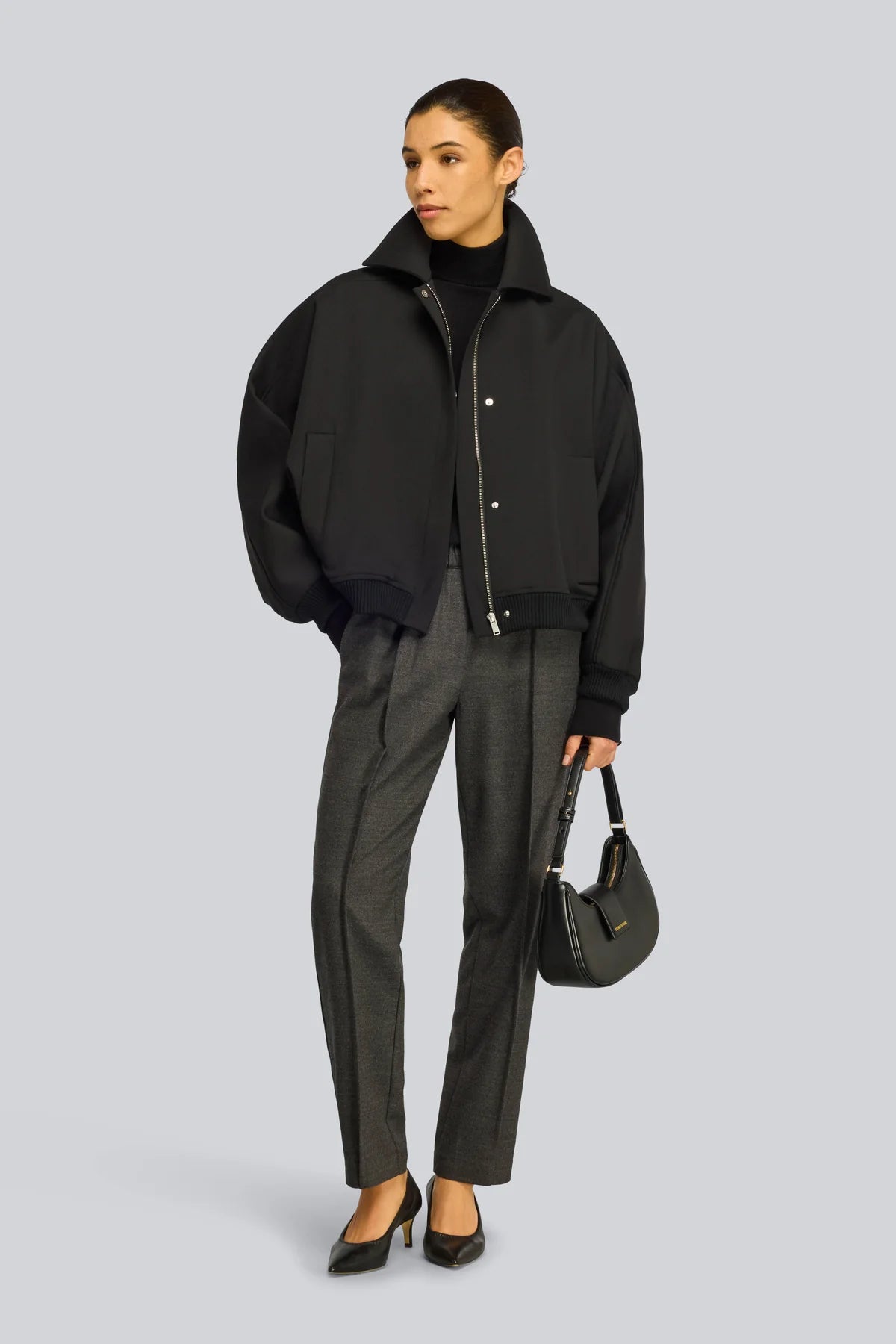 BOMBER CUELLO