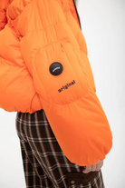 PLUMAS CORTO NARANJA