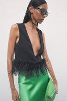 TOP PLUMAS