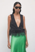 TOP PLUMAS